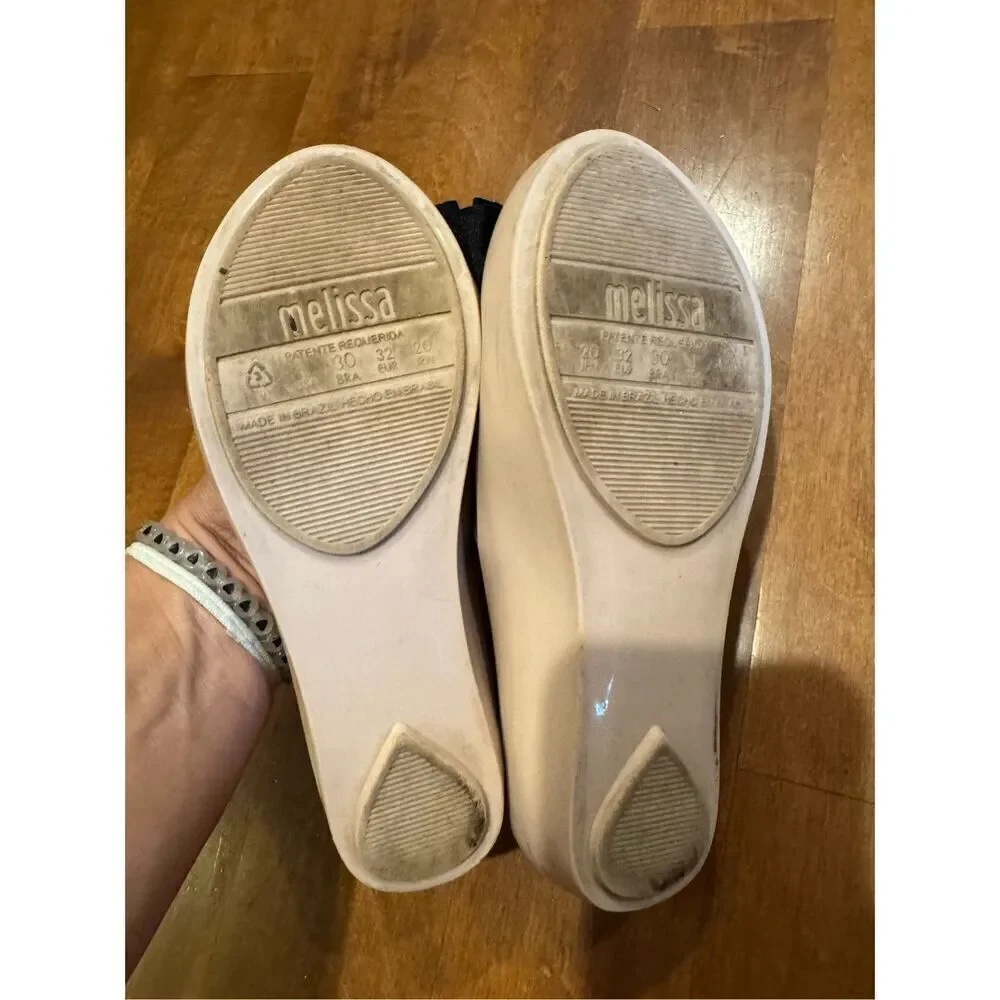 Little girl size one Melissa flats size one